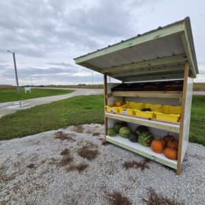 a produce stand with different types of fresh produce